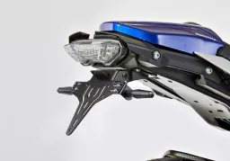 Set porta targa comprensivo di catarifrangente e luce targa