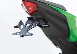 Set porta targa comprensivo di catarifrangente e luce targa